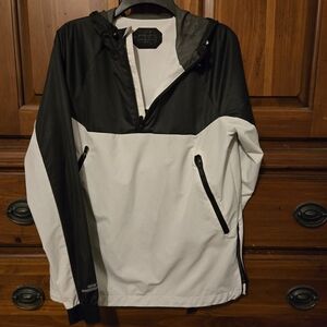 Under Armour Black and White Gore Tech Hooded Windbreaker. Mens Small.